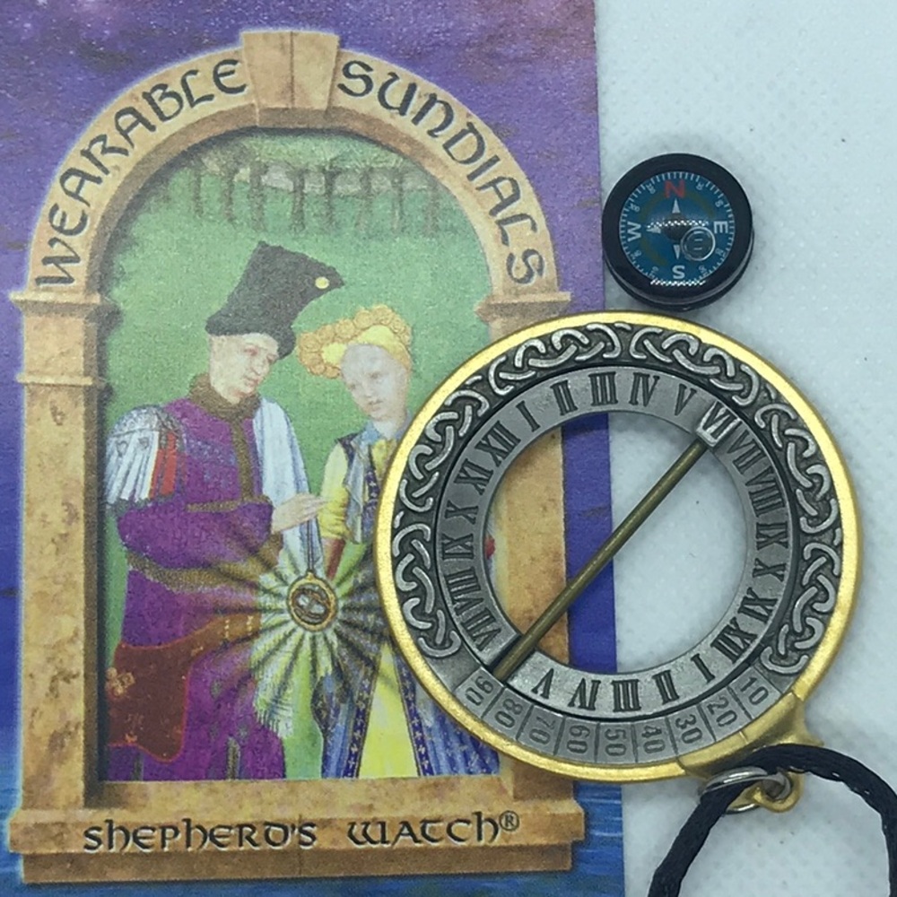 NWOT WEARABLE SUNDIAL NECKLACE, PACKAGED WITH. INSTRUCTION BOOKLET